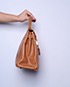 Kelly Retourne 28cm Veau Courchevel Leather in Gold, side view